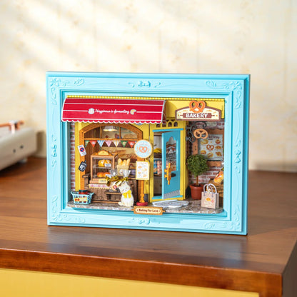 Rolife Fluffy Cat Bakery DP001 assembled model lit up on a tabletop display