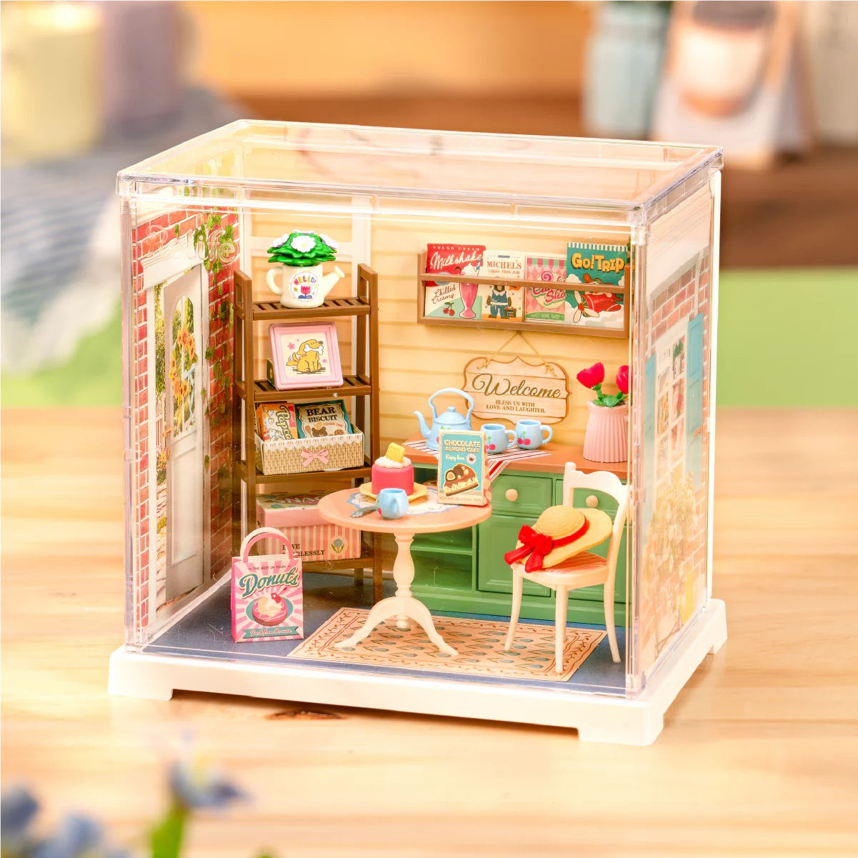 Rolife Sunshine Sip Porch DWS07B displayed as a cosy tea porch miniature scene on a tabletop.