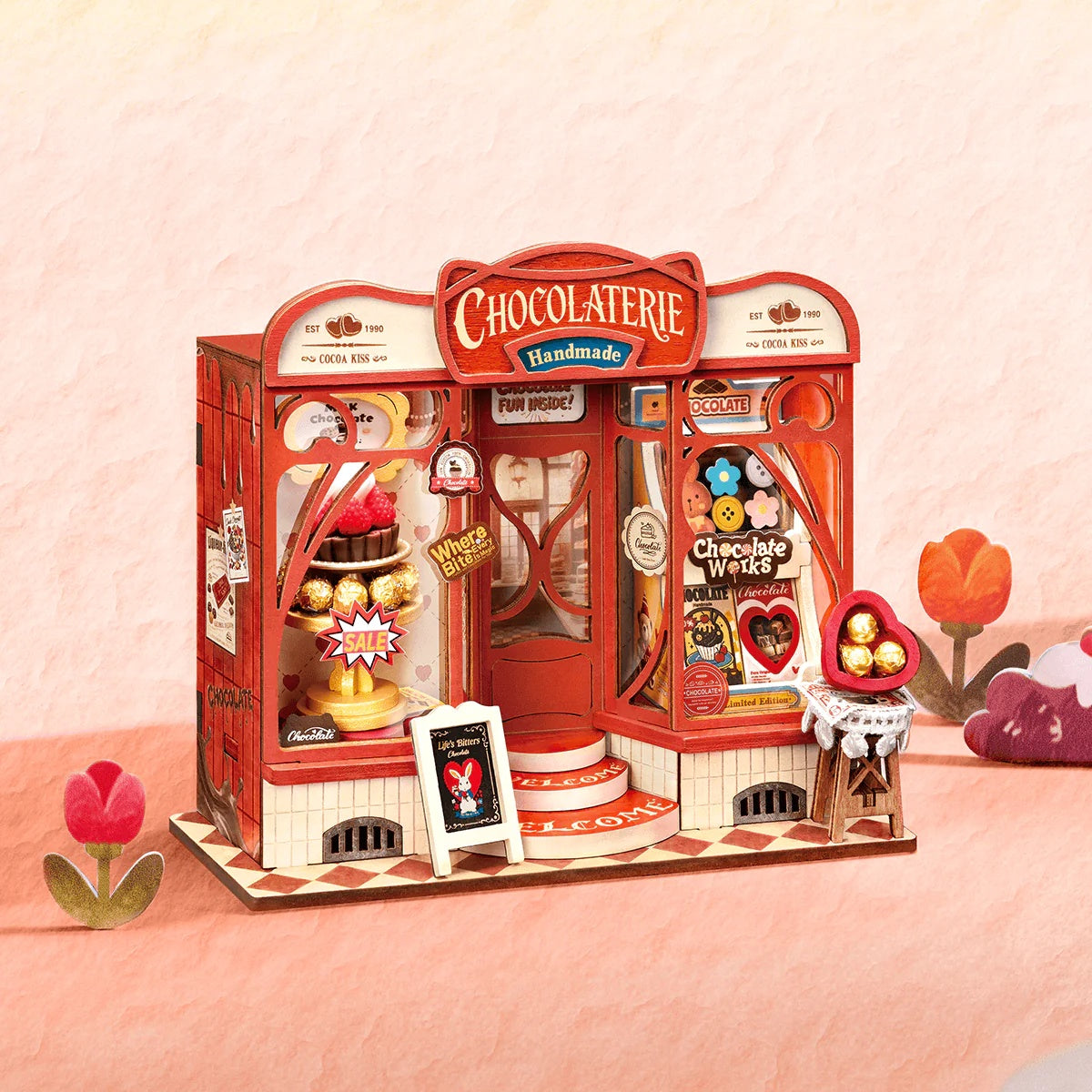 Rolife Sweet Chocolate Shop DS046 miniature chocolate store displayed in a styled pink lifestyle scene