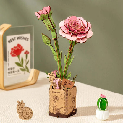 Rowood Pink Carnation TW051 wooden flower puzzle displayed in a home decor scene