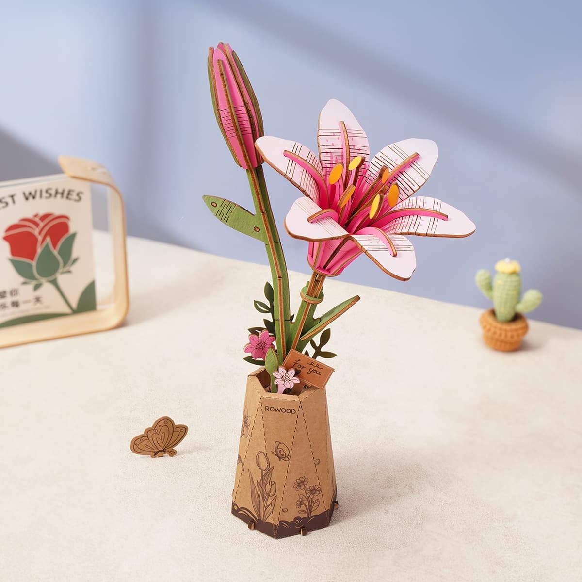 Rowood Pink Lily TW071 wooden flower puzzle displayed on a desk in a home decor scene
