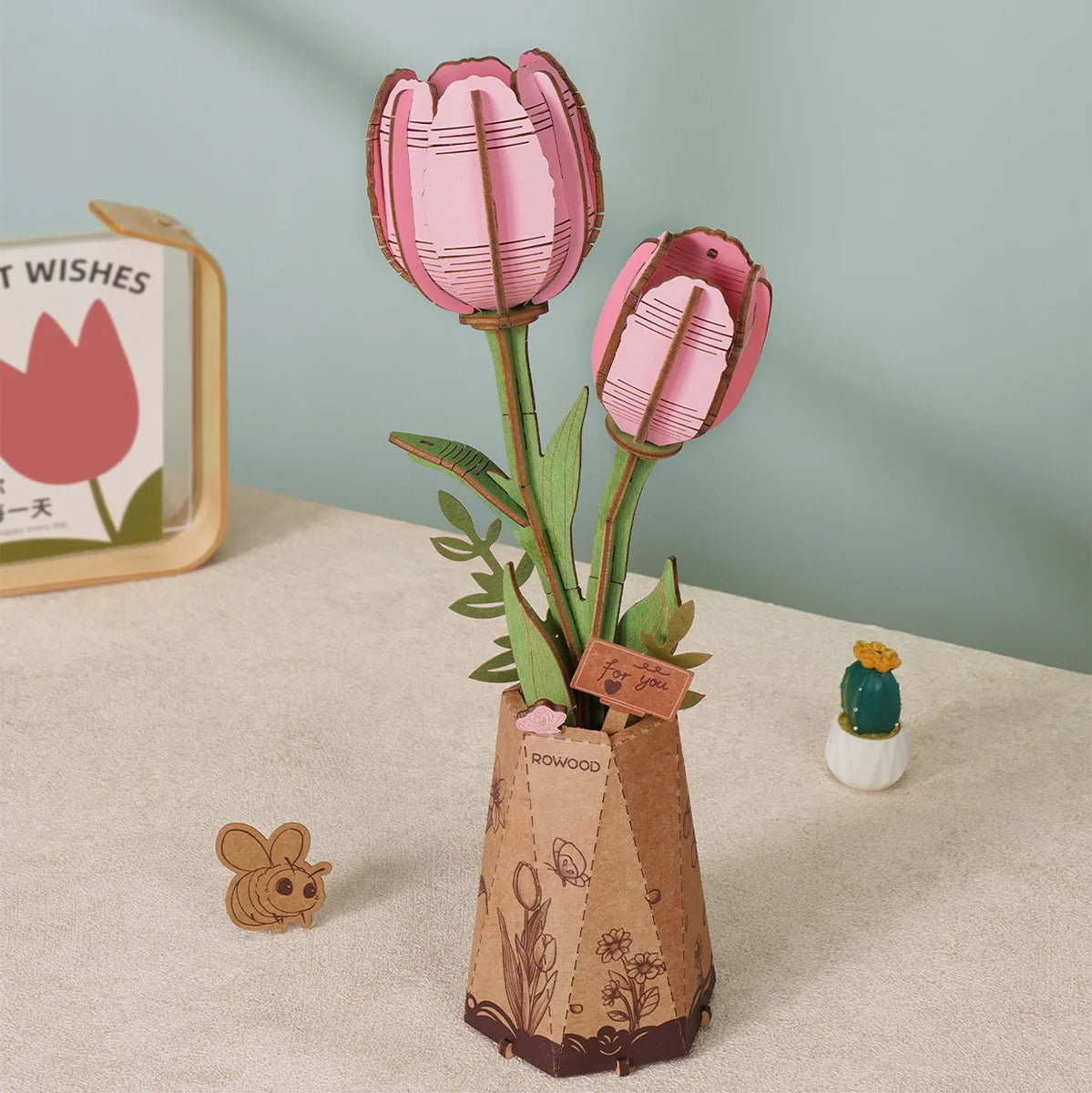 Rowood Pink Tulip TW082 wooden flower puzzle displayed as pink tulip desk decor with soft green background