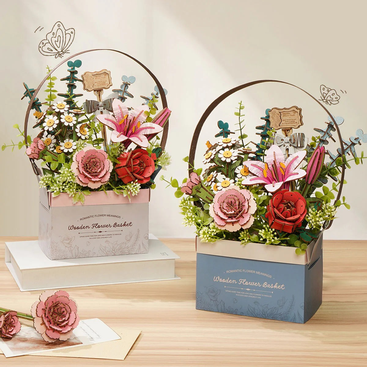 Rowood Wooden Flower Basket TW03H finished bouquets shown in pink and blue basket colour options on a tabletop display
