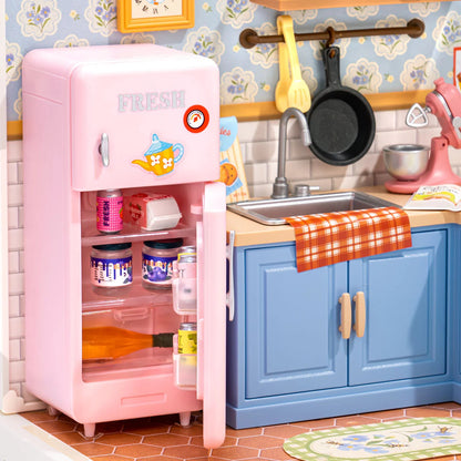 Rolife Homely Baking Kitchen DWS08B close-up with open pink refrigerator, blue cabinets, sink and kitchen accessories.