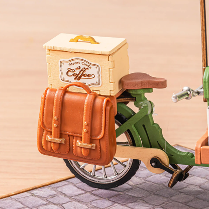 Close-up detail of the Rolife Aromatic Coffee Cart DG182 bicycle frame, rear box and side bag