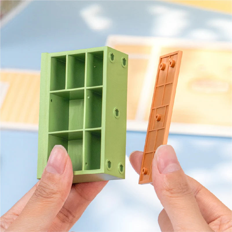 Rolife Mini Super Creator snap-fit assembly parts showing cabinet components for easy DIY building.