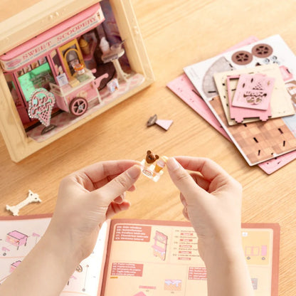 Rolife Sweet Scoopery Ice Cream DP002 assembly process showing miniature parts and instruction manual