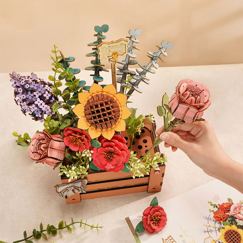 Rowood Wooden Bloom Box TW02H flower arranging detail showing a wooden rose being placed into the bloom box