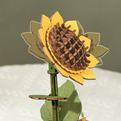 Close-up of the assembled wooden sunflower in the Rowood Wooden Flower Bouquet TW01H showing layered petals and textured wooden centre.