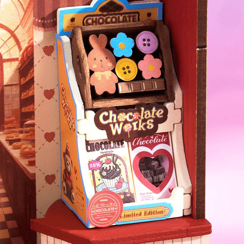 Rolife Sweet Chocolate Shop DS046 close-up of Chocolate Works miniature shelf with bunny and flower chocolates