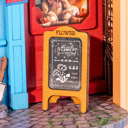 Rolife Daily Fresh Flower DP003 close-up of miniature chalkboard sign beside the red cabinet and shop entrance