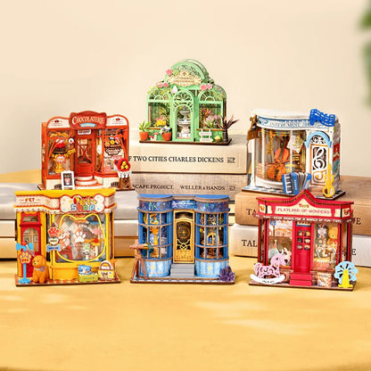 Rolife Tiny Stores tabletop collection display featuring Pawfect Pet Shop DS045 with other miniature shop kits