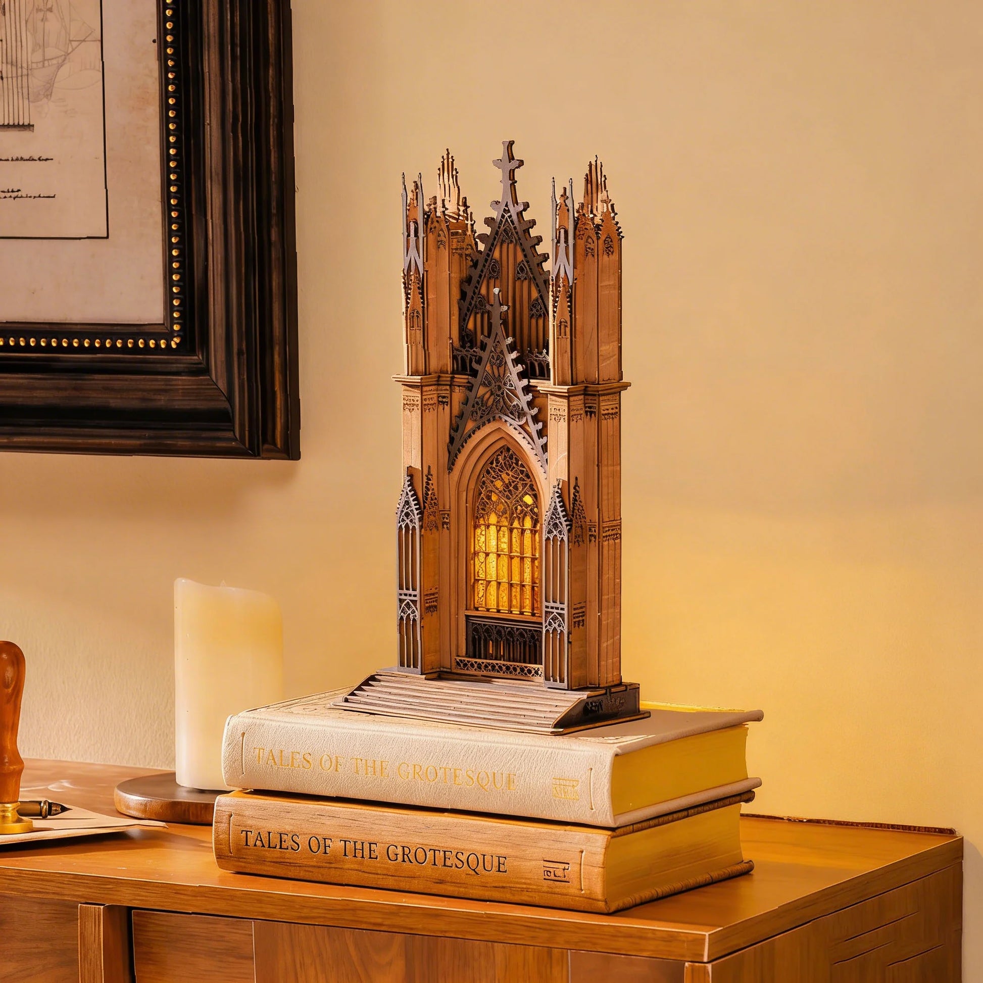 Rolife Twin-Tower Cathedral TGA01 displayed on books with warm glowing cathedral light